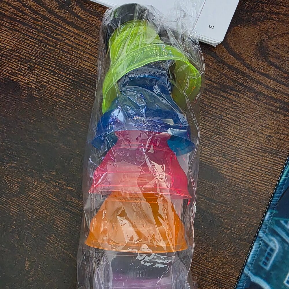 6 piece New Can covers multi colored-